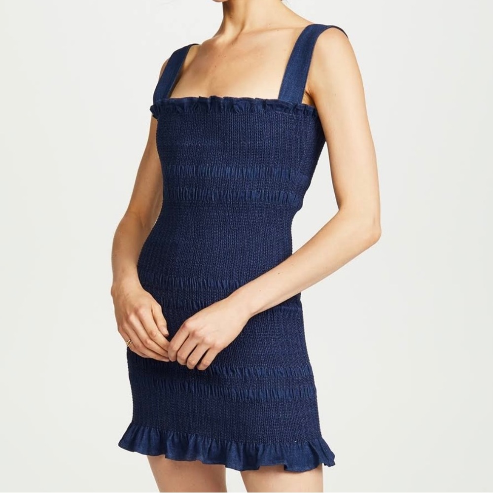 Adorable denim dress. Super flattering and flirty
